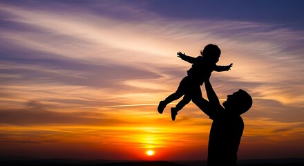 Silhouette of Father Tossing Child in Air at Sunset
