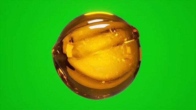 A translucent amber sphere with a reflective surface floats in the center against a vibrant green background.