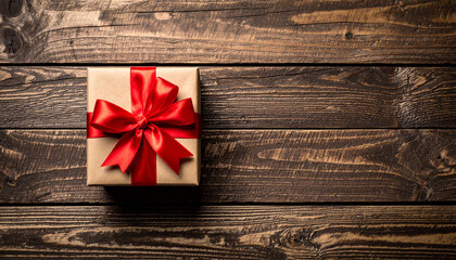 una caja de regalo sorpresa elegante con lazo rojo sobre fondo de madera y espacio para texto, para campañas de Navidad, San Valentín, Día de la Madre, dia de los enamorados  y campañas de marketing