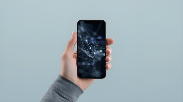 Hand holding smartphone displaying digital network concept  