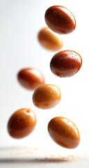 Obraz premium Floating, glossy, caramel-colored and light-brown orbs