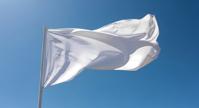 White flag waving in clear blue sky symbolizing peace or surrender in bright sunlight, captured in high-resolution photography