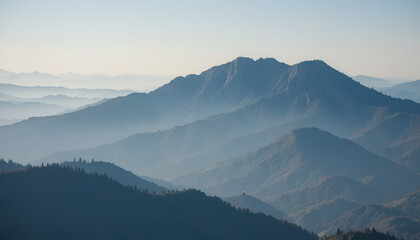 Layered mountains in hazy blue atmospheric distance