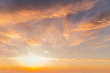 abstract background of cloudy sunset sky golden hour