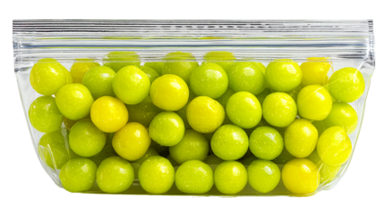 Fresh green and yellow candy balls in a clear package, perfect for treats, snacks, and sweet cravings, ideal for marketing and design projects isolated on transparent background