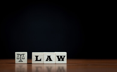 law concept with justice symbol blocks on desk