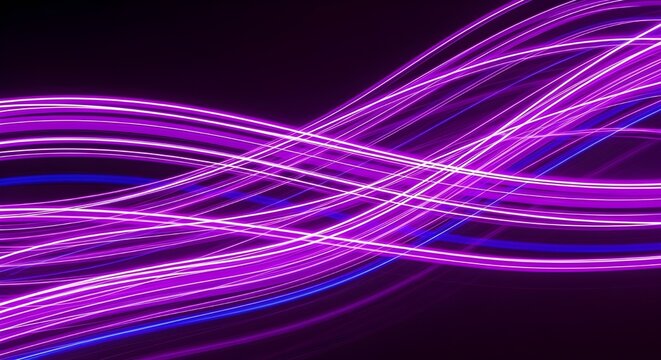 Abstract flowing purple and blue light trails on a dark background