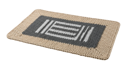 Rectangular handwoven beige and gray doormat with striped pattern on black background