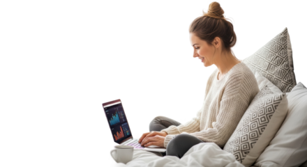 Young caucasian female analyzing data on laptop in cozy bed setting