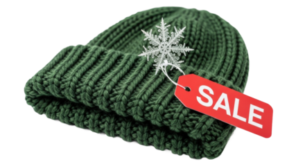 Green knit winter hat with sale tag and snowflake decoration