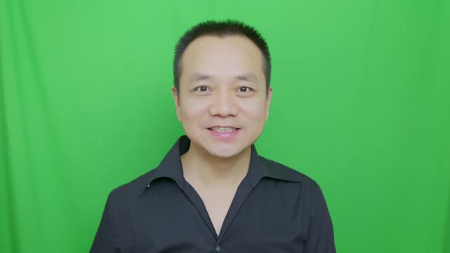 Mature Asian man blows kiss, a man expressing love, man's reaction when find a beautiful woman.