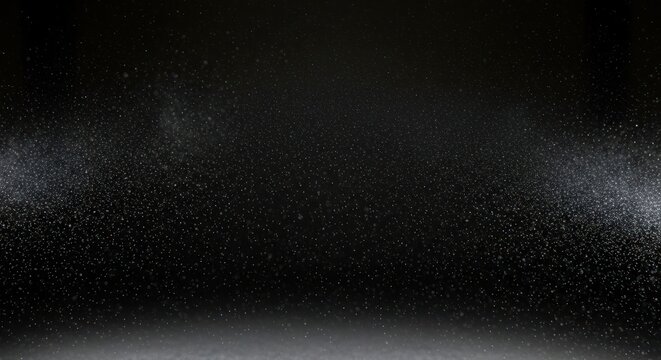 A dark, textured background with subtle white mist particles scattered