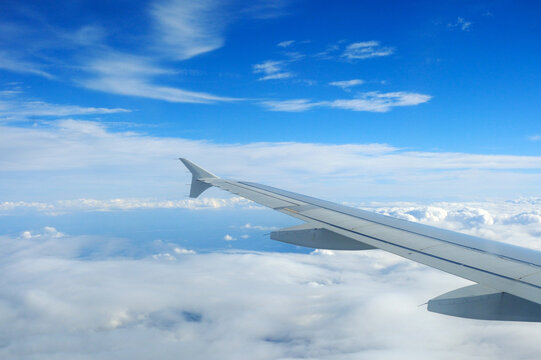 Airbus A320 wing and clouds during the cruise
