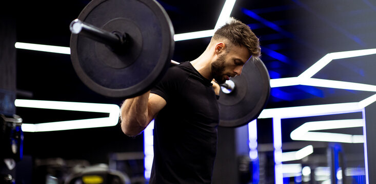 Weightlifting session at a modern gym focusing on personal strength and fitness journey