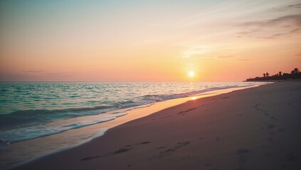 Fototapeta premium Serene Sunset Over Tranquil Beach with Gentle Waves and Clouds