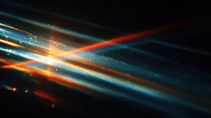 Colorful light leak overlay effect on black background creating a retro, noisy film texture with abstract lens flare and grunge film burn backgrund