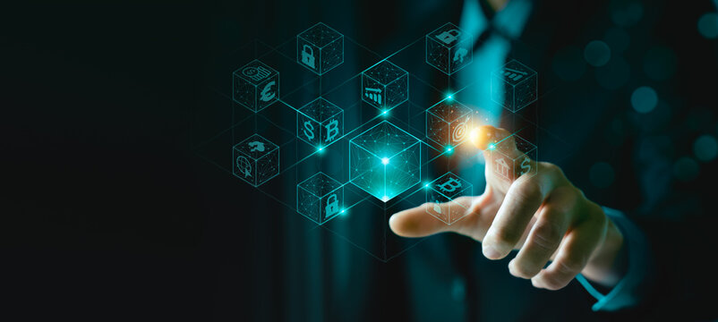 Blockchain technology and digital finance concept with businessman touching virtual blocks and cryptocurrency symbols, representing innovation, decentralization, fintech, and secure financial network