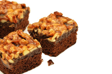 Part of piece Mocha Toffee Cakes, isolated on white background