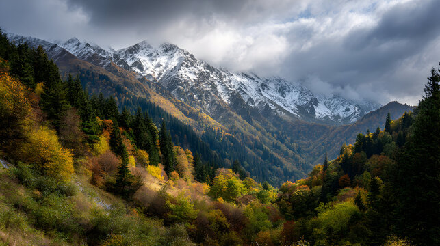 Mountain peaks with snow under a moody sky; landscape background, travel posters.