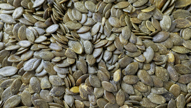 Close up of pumpkin seeds, selective focus.