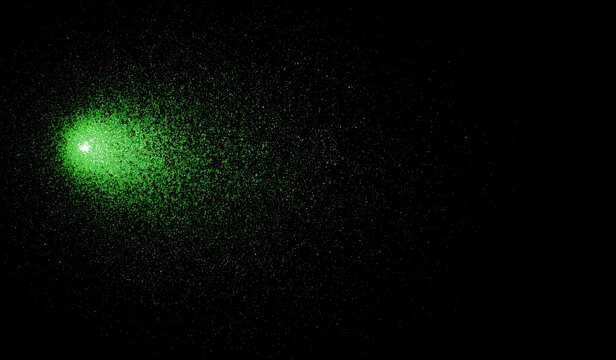 A mesmerizing green comet hurtles through the darkness of space, a celestial beacon of light