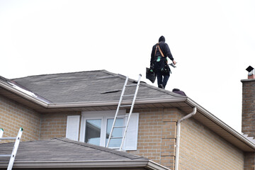 Roofer on the roof