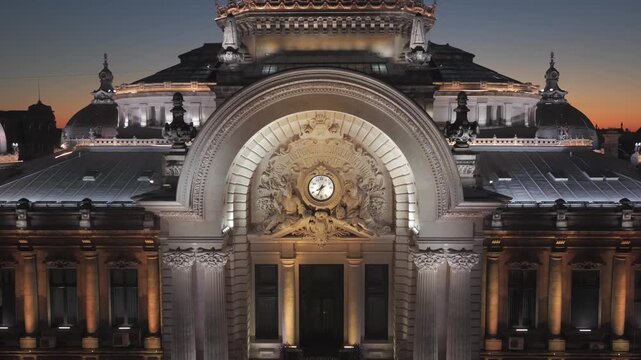 Landmarks of Bucharest. Aerial drone 4K video with CEC Palace and Palace of the Parliament historical buildings in Romania during a summer evening sunset. Travel to Romania.