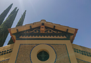 Wooden nest box or bat shelter attached under cornice