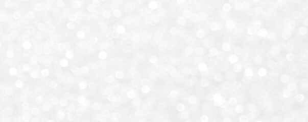 White and gray bokeh background. Photo can be used for the concepts of New Year, Christmas, Wedding...