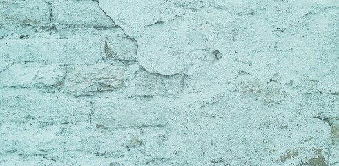 Verwitterte alte türkisfarbene Wand als Hintergrund 