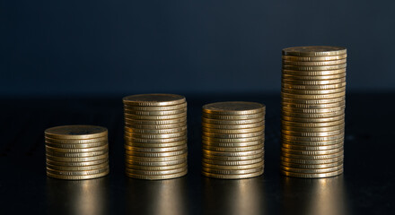 Pile of gold coins on black background