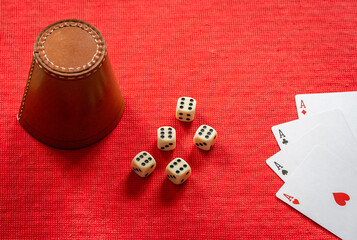 Four Aces and Perfect Dice Roll Showing All Sixes Symbolizing Maximum Score and Gambler&rsquo;s Luck