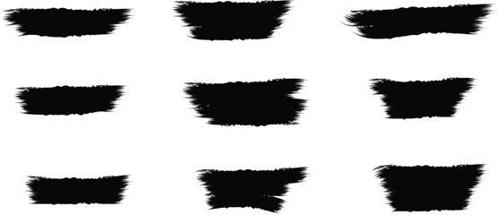 Collection of nine black rough textured brush stroke elements on white background