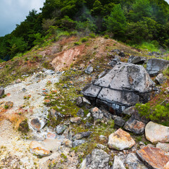 Several views of the Hell of Kumatsu (Komatsujigoku), where a wooden path leads you through a collection of boiling mud pools and steamy fumaroles demonstrating the volcanic activity taking place just
