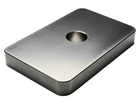 Industrial steel base plate component with a center-drilled hole on a transparent background