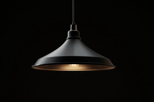 A black lamp with a light on it