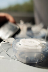 Insulin pump infusion set with introducer needle on table during diabetes care routine