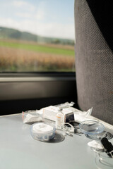 Insulin and diabetes infusion set supplies on train table during travel