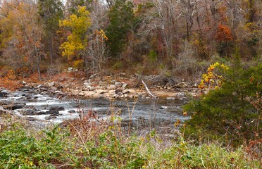 Rapids of Rappahannock River surrounded by fall color