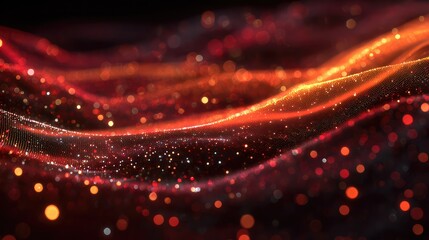 Abstract glowing particles forming a flowing wave background