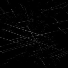 Fototapeta premium Abstract image of light streaks against a dark background, resembling shooting stars.