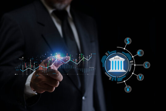 Businessman touching stock market graph and currency icon on a virtual screen display. business profit chart trade growth index economy concept.