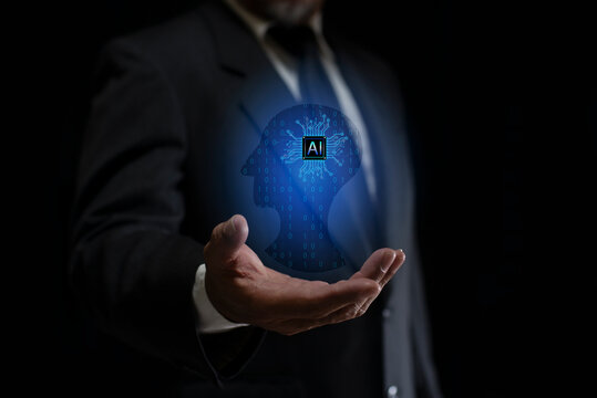 Businessman hands holding creative glowing digital AI brain hologram. Artificial intelligence concept.