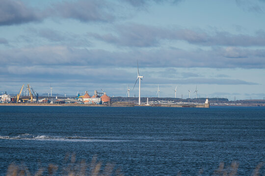 Blyth Port and Turbines &mdash; Coastal Industrial Scene with Wind Energy, Cranes, and Partly Clouded Sky