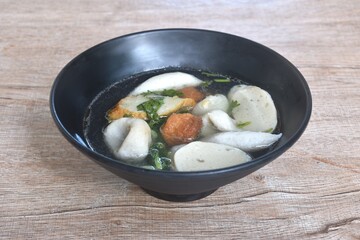 boiled fish and shrimp  meatball with cabbage in clear soup on bowl  