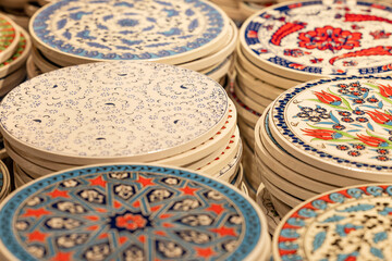 Many painted decorative plates at the Turkish bazaar.
