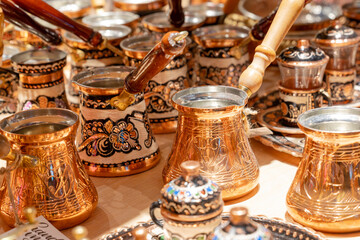 Copper hand-held coffee makers called Turkas at a Turkish bazaar.