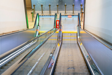 An empty elevator for people inside the airport terminal.