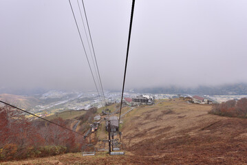 The beautiful view autumn foliage from chairlift at Happo Alpen Line