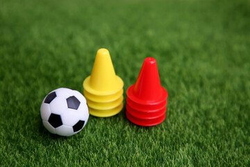 Soccer football training; soccer ball and cones; football coaching academy